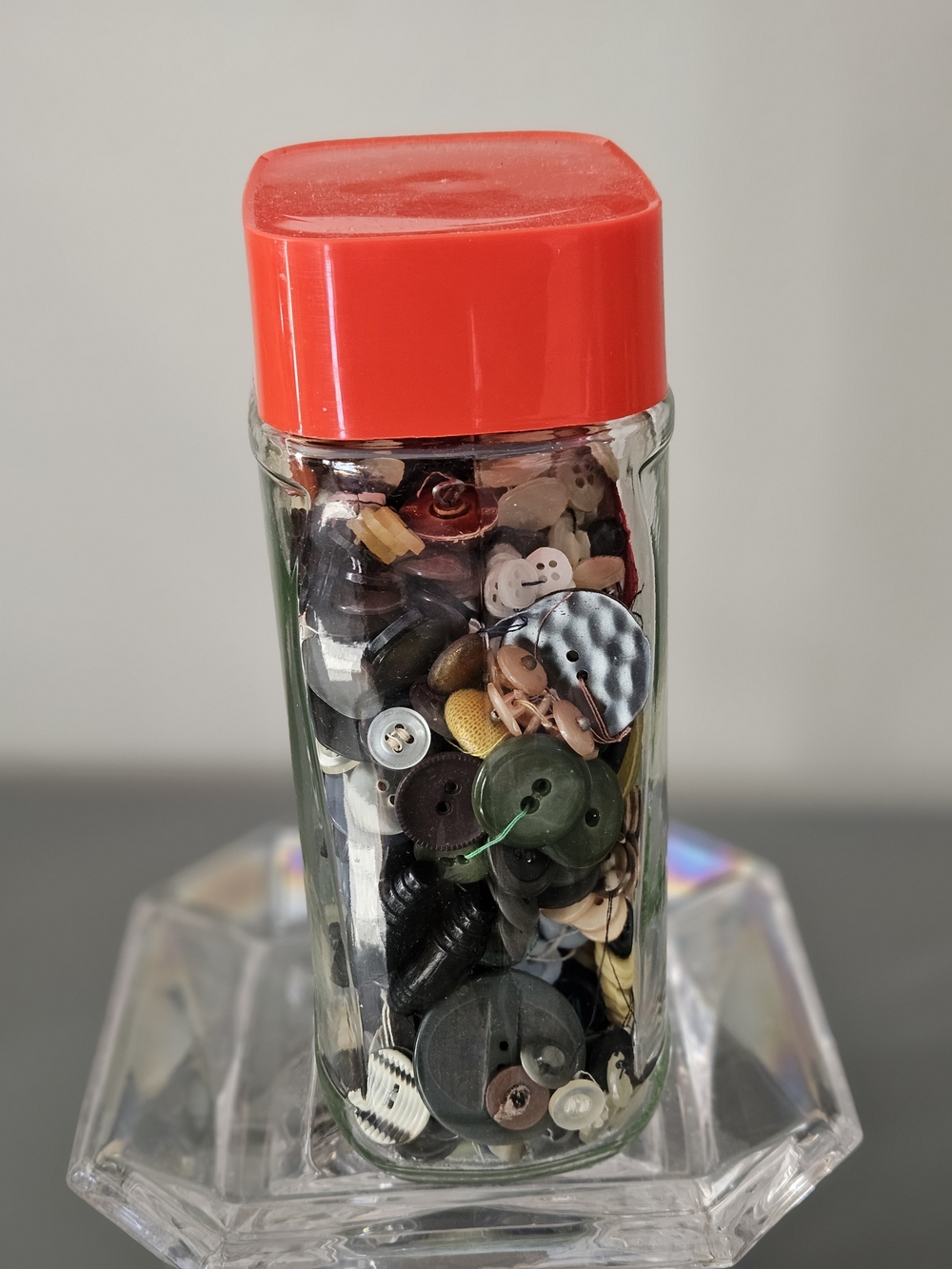 Glass Jar of Vintagr Mixed Sewing Buttons with Red Lid